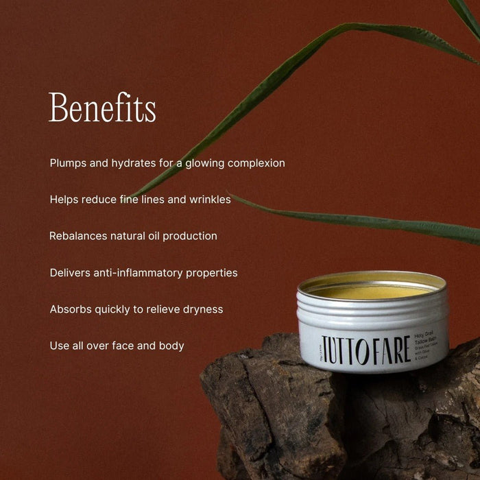 Holy Grail Tallow Balm - 70g by Tuttofare with benefits listed, placed on rustic wood with green leaves background