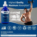 Low Sodium Mega-Mag - 400mg - 118ml bottle with supplement facts and fitness model lifting weights by Trace Minerals.
